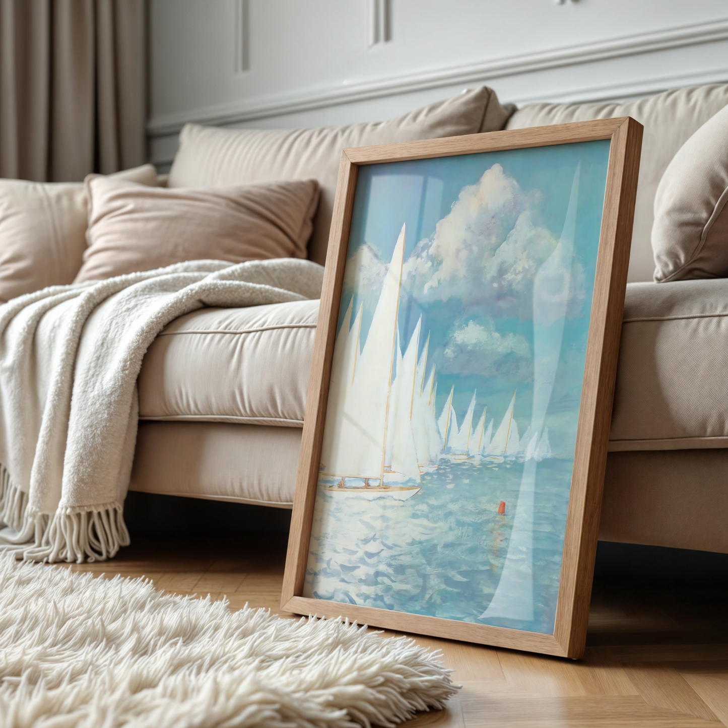 Framed artwork of sailboats on a lake in a living room setting